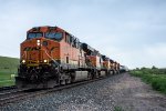 BNSF 5767 leads a manifest west at Winson